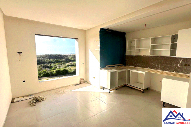 Appartement au rez-de-chaussée d’un immeuble neuf 4