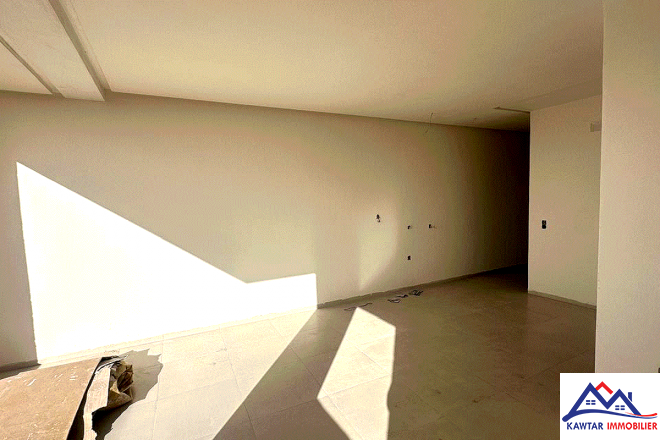 Appartement au rez-de-chaussée d’un immeuble neuf 6