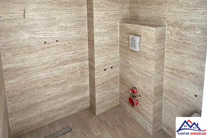 Appartement au rez-de-chaussée d’un immeuble neuf 9